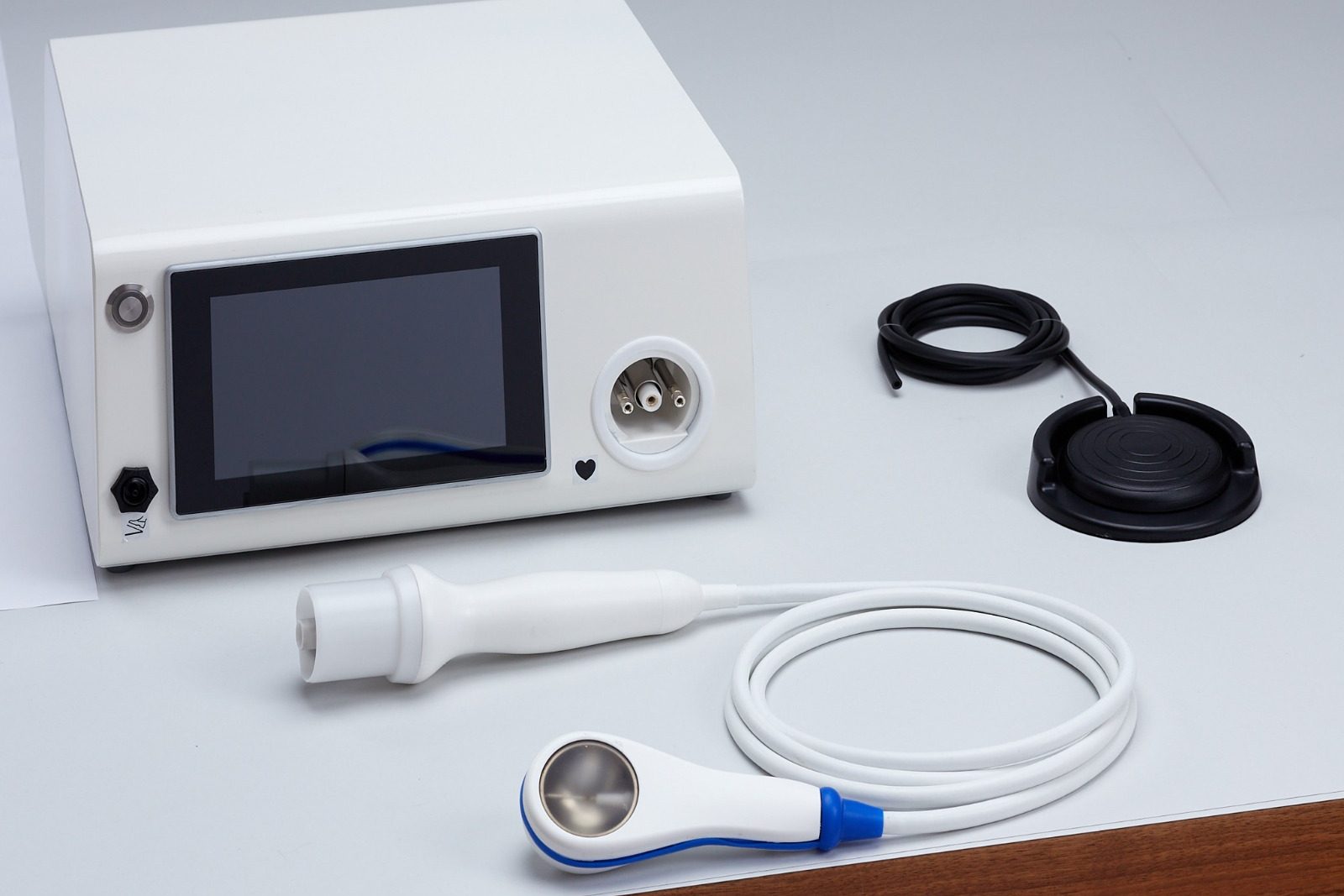 A handheld applicator used in shockwave therapy.